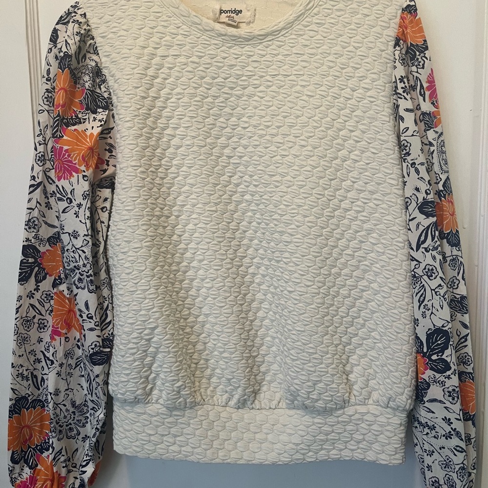 Anthropologie top ivory, navy, orange and pink comfortable,flattering